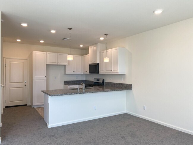 Building Photo - Introducing a Stunning New Build, Never Li...