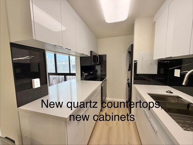 Foto del edificio - Luna-Liho Towers - Fully renovated, washer/dryer in the unit, AC