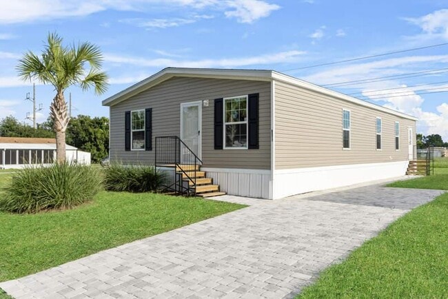 Building Photo - 6571 Hidden Oaks Dr