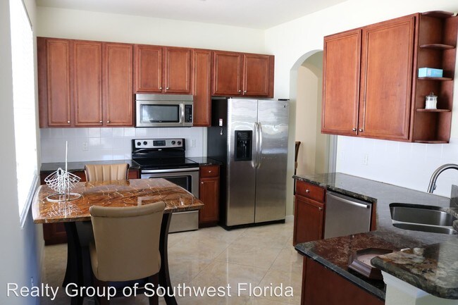 Building Photo - 4 br, 2.5 bath House - 7916 Summer Lake Court