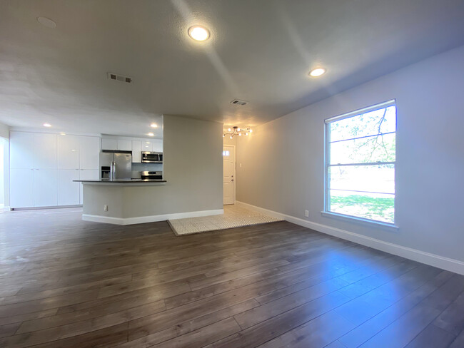 Front living room, open kitchen, dining room - 306 W Northgate Dr