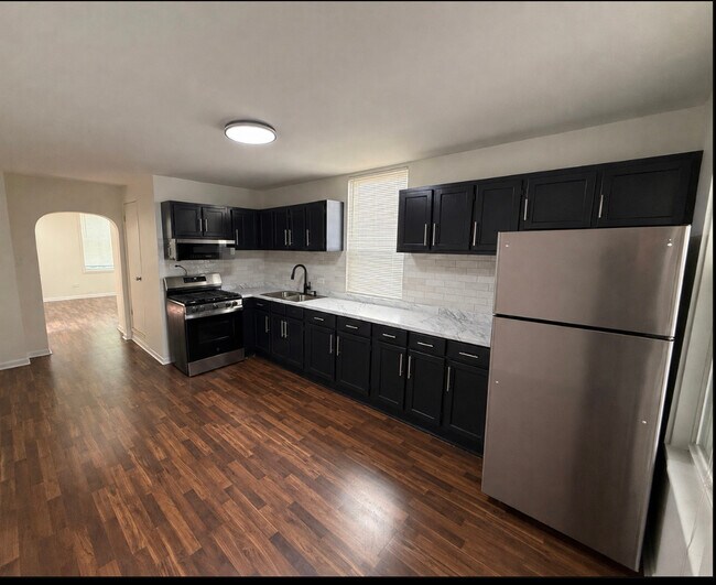 Foto del edificio - 1617 W 38th Pl