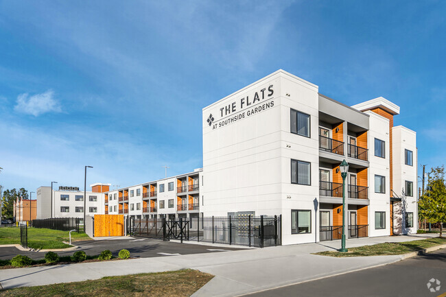 Building Photo - The Flats at Southside Gardens