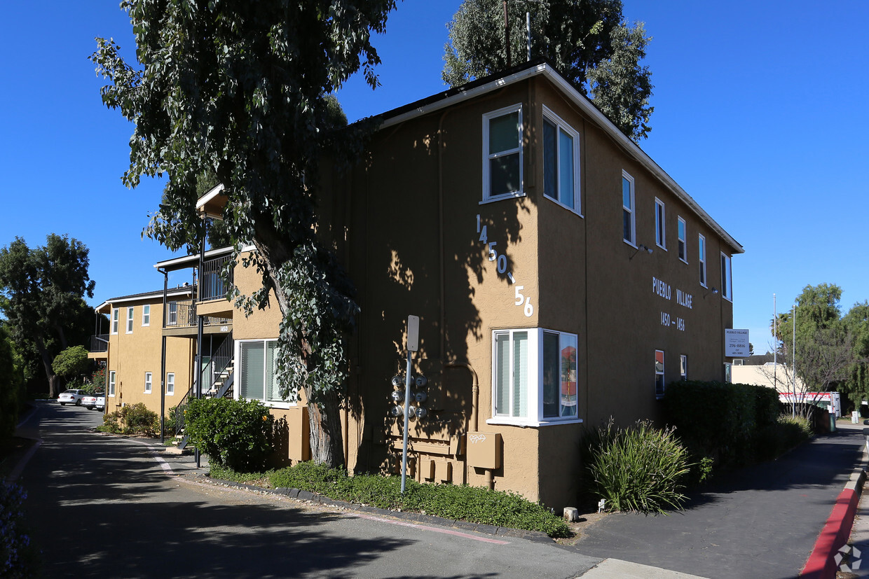 Primary Photo - Pueblo Village Apartments