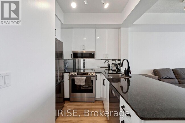 Building Photo - 1-2811 Elm Dr W