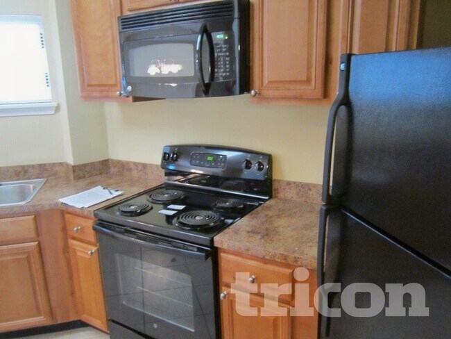 Foto del edificio - 6904 Holiday Rd N