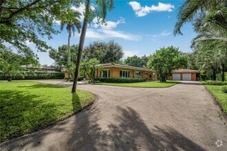 Building Photo - 7020 Almansa St