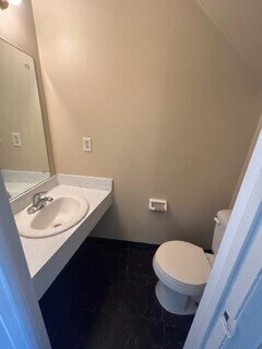 Building Photo - Now Leasing 2 Bedroom 1.5 Condo Located In...