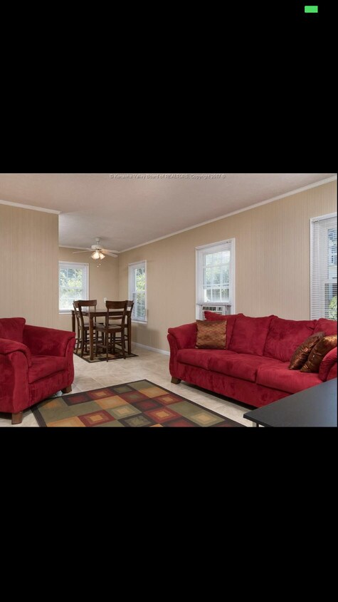 Living Room with new flooring throughout! - 1405 Ravinia Rd