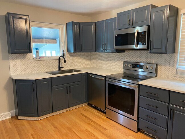 Building Photo - Newly Renovated Home with 2 Car garage in ...