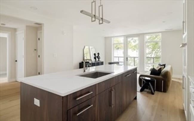 Photo - 1 Bed • 1.5 Bath • Garage Parking • New Luxury Building – Available Now, December, or January House