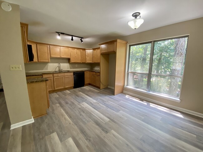 Kitchen with Granite countertops and custom cabinets - 5167 Cornell Dr