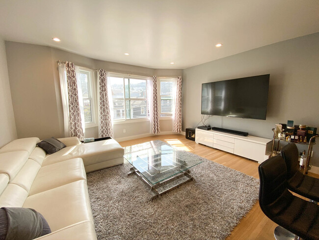 Well lit with large windows, and recess lighting throughout. - 434 Kirkham St