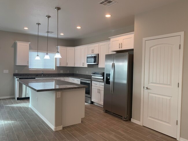 Building Photo - 9793 W Camelia Dr