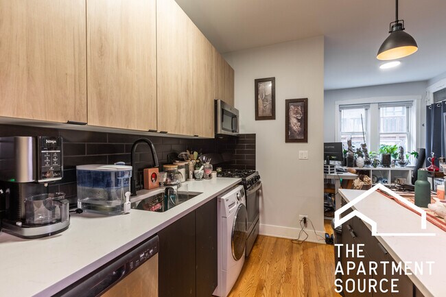 Foto del edificio - 4009 N Lowell Ave