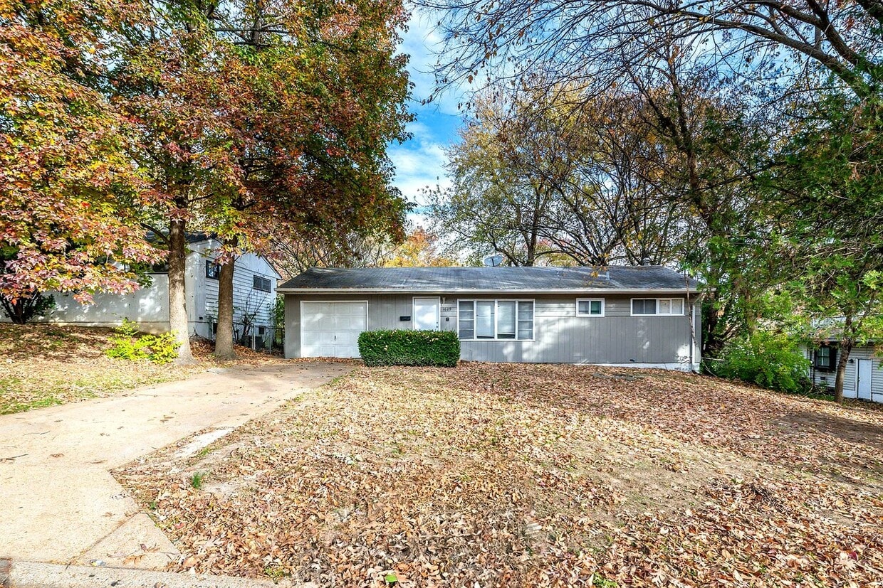 Primary Photo - Charming Mid-Century Home with Basement and Fenced Backyard!
