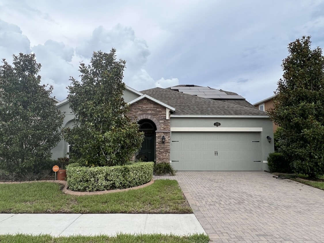 Foto principal - "Spacious 4-Bedroom Lutz Home with Elegant...