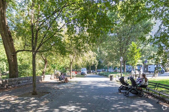 Enjoying Riverside Park on a wonderful day in the neighborhood.