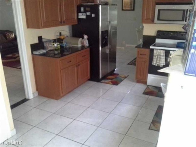 Building Photo - 4810 Mango Dr