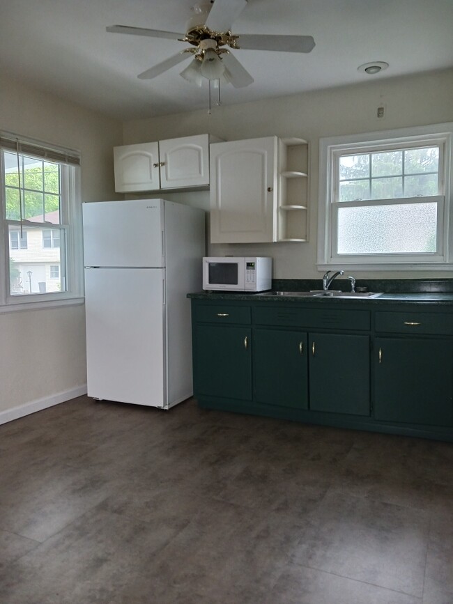 New flooring in kitchen. Light filled space - 32 Duquesne Ave