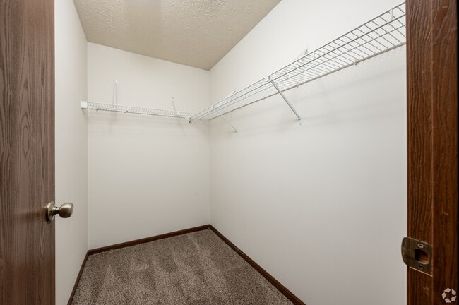 Walk in closet in Primary Bdrm - Basswood Apartments