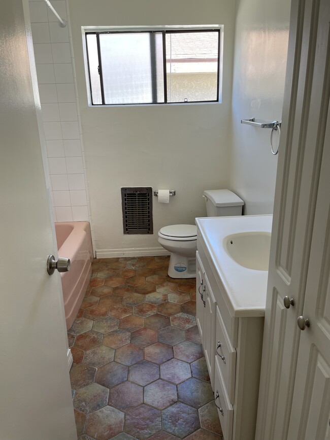one bathroom with tub and shower - 8850 Alcott St