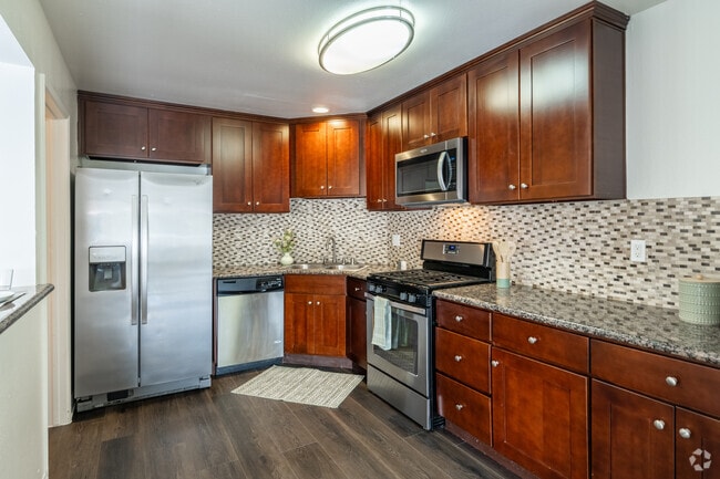 3BR, 2BA - Deauville - 1,300SF - Kitchen - Versailles on the Lake Apartments