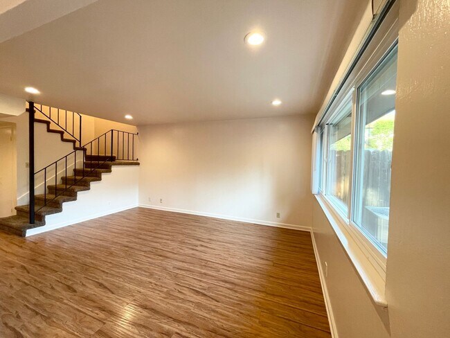 Building Photo - Bright and Clean Two Level Unit in Lovely ...