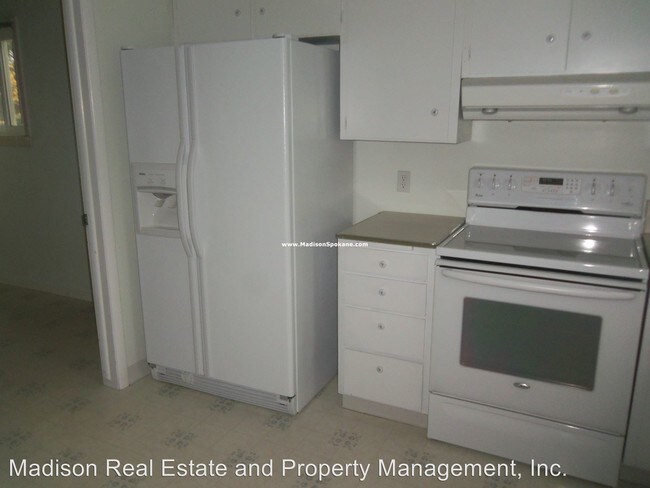 Foto del edificio - 3 br, 1 bath House - 1403 E. 40th Ave.