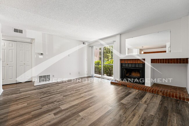 Building Photo - Charming Condo with Washer/Dryer and Patio