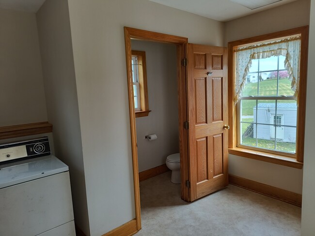 laundry room and half bath on main floor - 14736 Heavenly Acres Rdg