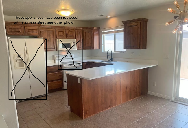 Kitchen, old appliances have been replaced! - 2422 S River Rd