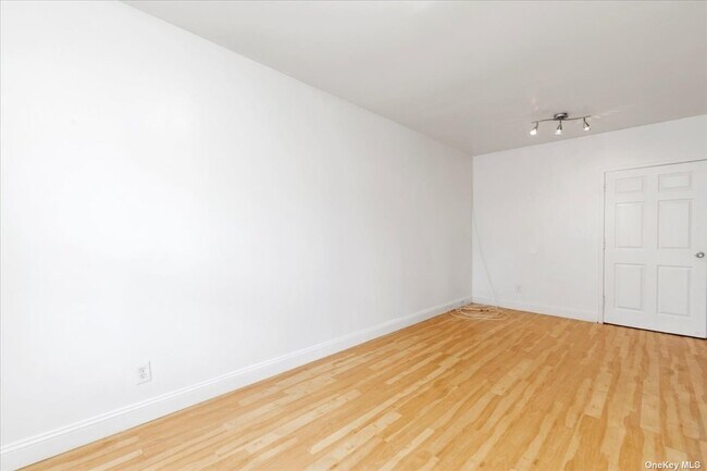 Building Photo - 60-34 Flushing Ave