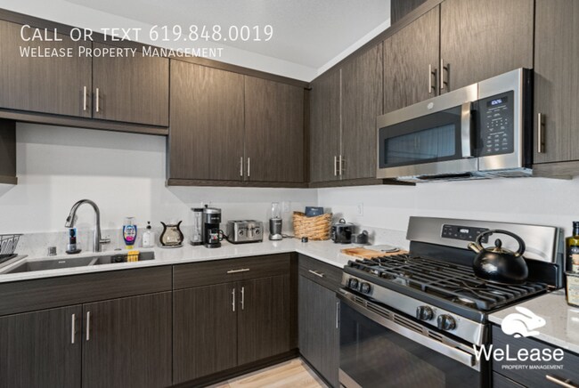 Foto del edificio - Charming 2-Bedroom Home with Patio and Com...