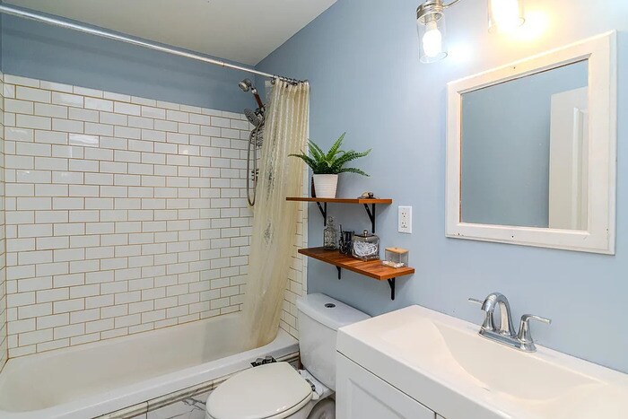 Foto del edificio - This charming 3-bedroom, 1-bathroom home