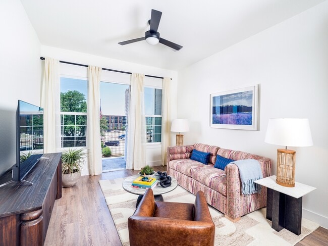 Enjoy the excitement of unobstructed views of the Dallas skyline right from your living area in select homes! - Modera Trinity