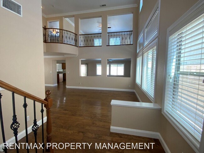 Building Photo - 3 br, 2.5 bath House - 5550 GOLDEN PALMS CT