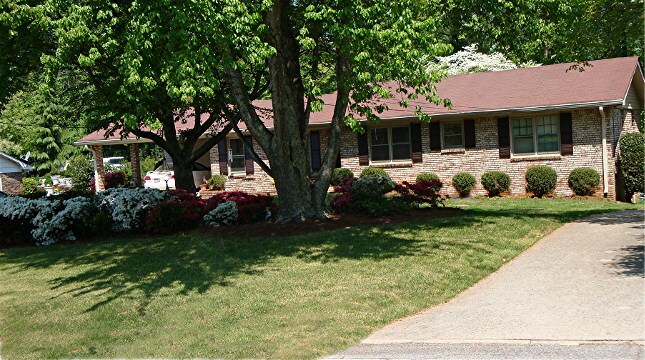 Front of house with driveway going to Apartment Includes Utilities except Cable - 3817 Cline Dr SE