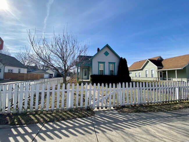 Building Photo - COMING SOON!! Charming Fountain Square victorian cottage w/ white picket fence!
