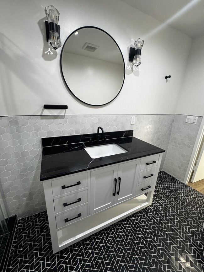 Marble-topped bathroom vanity - Windsor House