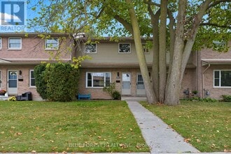 Building Photo - 991-991 Notre Dame Dr
