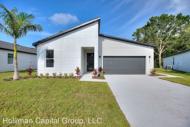 Building Photo - 4 br, 2 bath House - 306 Royal Palm Way