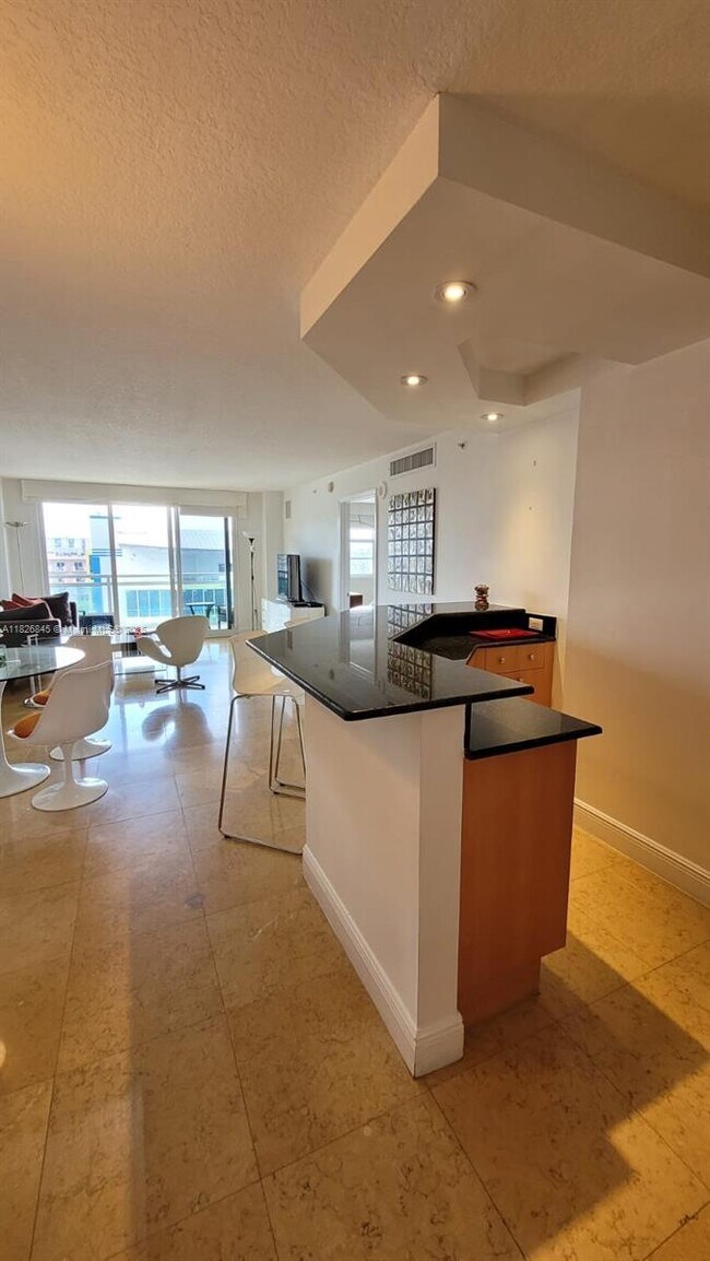 Building Photo - 6917 Collins Ave