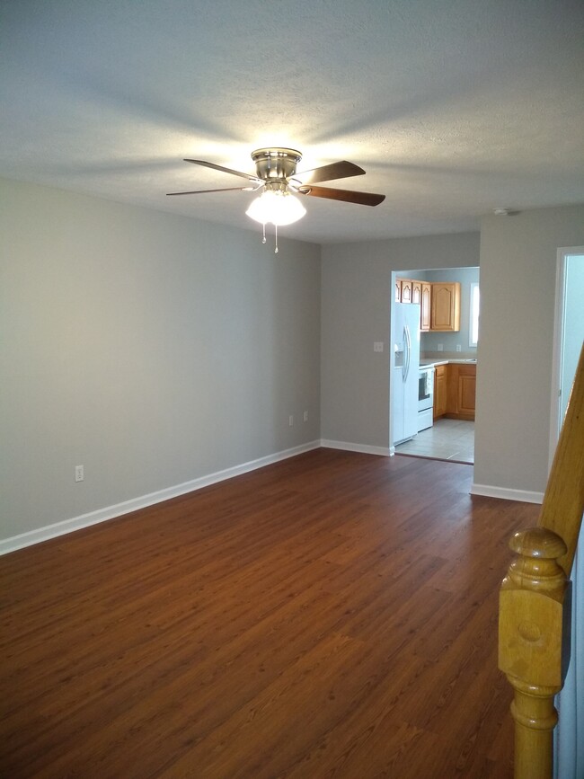 Living room with view of kitchen - 112 Winners Cir