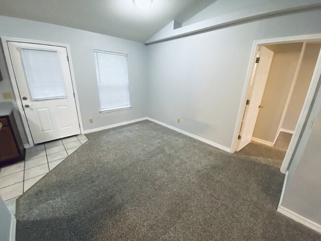 Building Photo - Fantastic location! This end unit offers t...