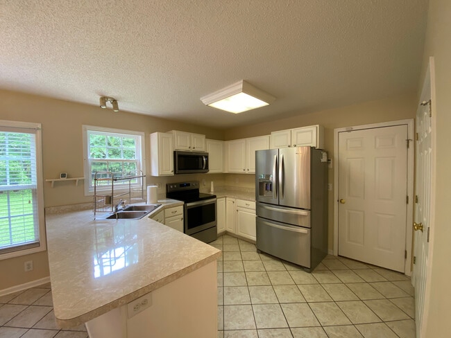 Building Photo - Room in Single Family Home on Ujamaa Dr