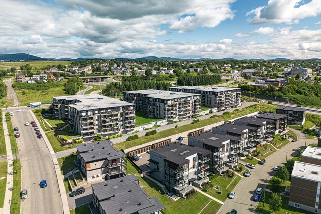 Building Photo - Les Belvédères sur le Fleuve Beauport Apar...