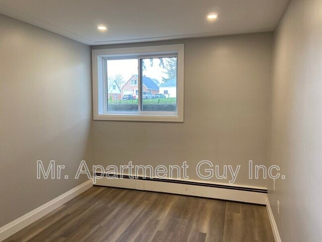 Building Photo - 1148 Queen's Blvd