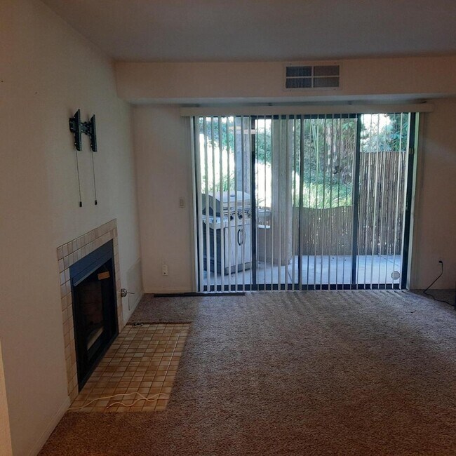 Living room with gas log fireplace - 9725 Mesa Springs Way