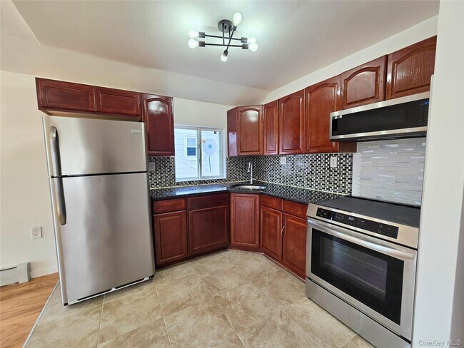 Foto del edificio - 219-23 114th Rd